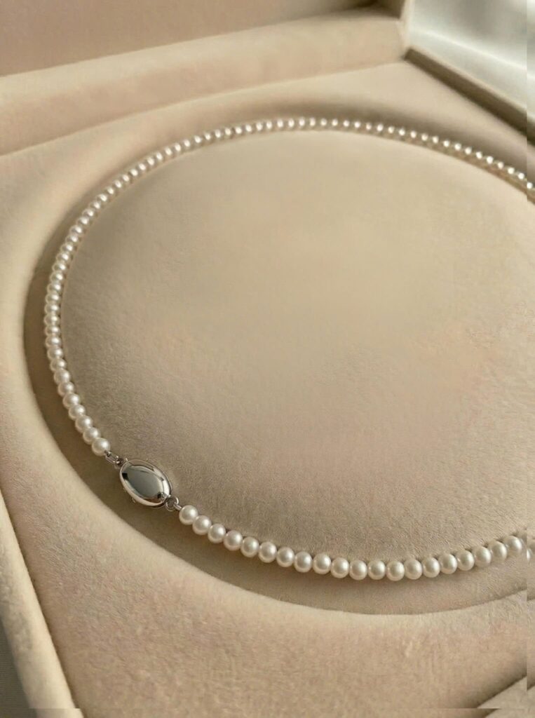 Chuộc ngọc trai Akoya nước mặn Phú Quốc 4mm Trắng Ngà dài 42cm chốt bạc S925