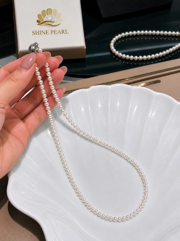 Chuộc ngọc trai Akoya nước mặn Phú Quốc 4mm Trắng Ngà dài 42cm chốt bạc S925